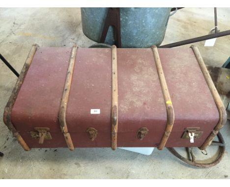 A canvas and battened trunk