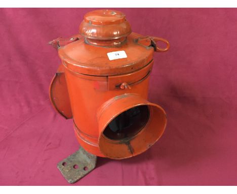 A large Vintage red painted railway lamp