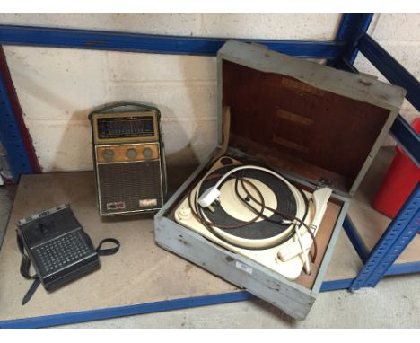 A Vintage record player, (sold as a collectors item); a Vintage Philips cassette recorder and a transistor radio