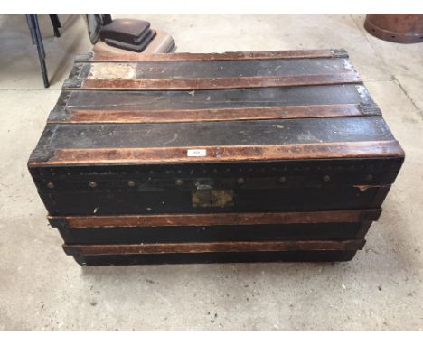 A battened travelling trunk