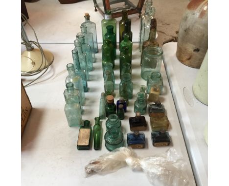 A quantity of various Vintage glass medicine bottles etc.