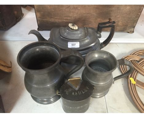 Two Antique pewter pot bellied tankards; a Victorian pewter teapot; and a metal milk half pint standard can, labelled E. Ashl