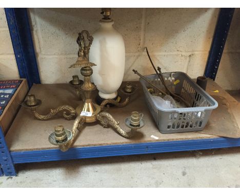A light fitting; a lamp base and a quantity of brass tap fittings etc.