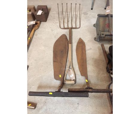 Two Vintage hay knives and a beet fork
