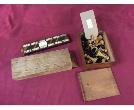 A set of Staunton style chess pieces; inlaid cribbage board; another cribbage board; playing cards etc.