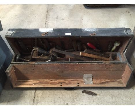A carpenter's toolbox and contents of various old tools