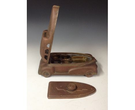 An Art Deco novelty tinplate artist's palette box, produced by Betel Motor Cars, cast as a flowing saloon car, the hinged cov