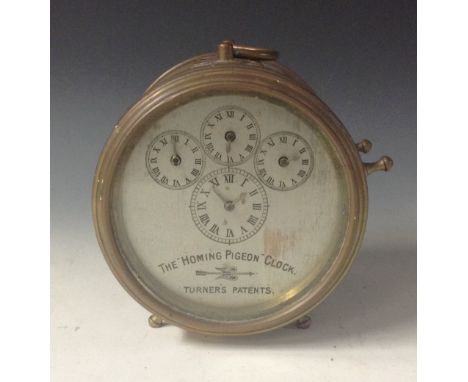 Pigeon Racing - an early 20th century Hateley's patent homing pigeon clock, the 11.5cm circular silvered register with four d