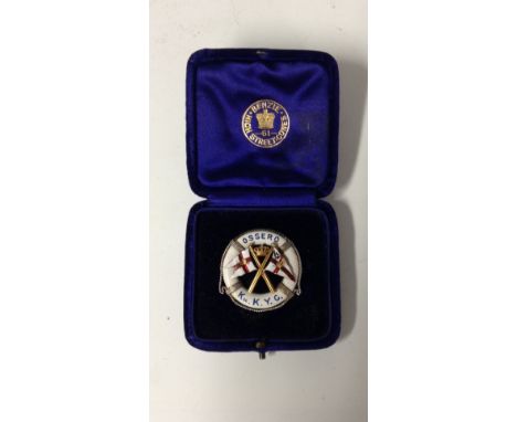 Yachting - Sailing, Benzie of Cowes, Isle of Wight, an 18ct gold and enamel circular yachting brooch, as a life buoy with cro