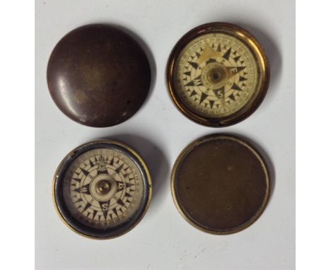 A 19th century brass gentleman's pocket compass, by J H Steward, Strand, London, 4cm diam; another, similar (2) 