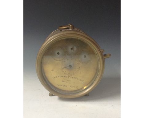Pigeon Racing - an early 20th century Hateley's patent homing pigeon clock, the 11.5cm circular silvered register with four d