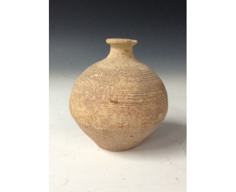 Antiquities - a Mesopotamian pottery globular jar, incised with bands, 12cm high

Provenance: Excavated during Sir Leonard Wo
