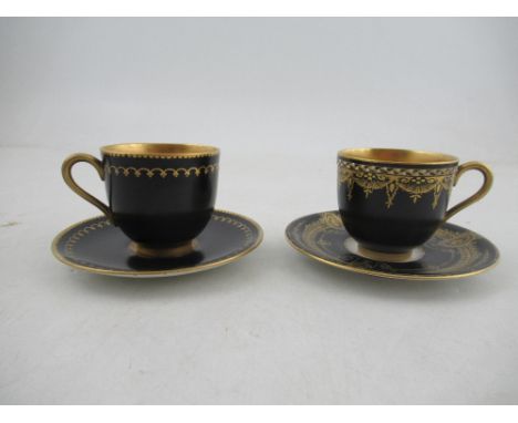 Two similar Royal Worcester black and gilt Art Deco coffee cups and saucers&nbsp;Condition Report:  Both cups are in good con