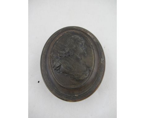 An early 18th century oval pressed horn snuff box with a portrait of Charles I by John Obrisset, initialed O.B to the lid  Co