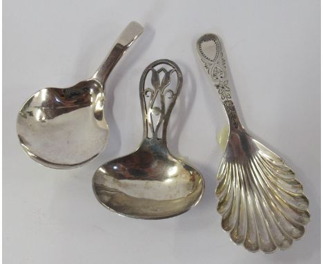 A silver caddy spoon, with pierced Art Nouveau design handle, Sheffield 1944, by DNH&amp; S, together with a silver caddy spo