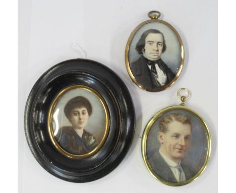Three oval portrait miniatures, a 1940's man, a Victorian man and a lady with fur stole, diameter 2.25ins