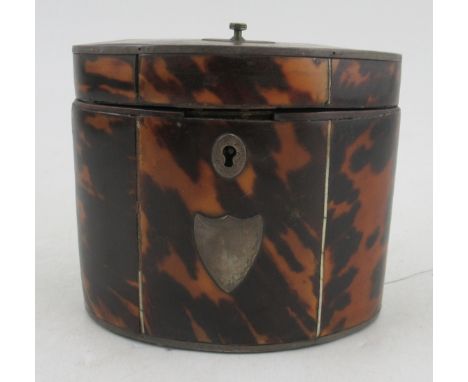 A small oval Regency tortoiseshell tea caddy, height 4ins Declaration Reference&nbsp; 8YU2HKMWCondition Report:  Lid slightly