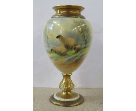 A Royal Worcester pedestal vase, decorated to the front with sheep in landscape by Barker, shape number 2260, height 6insCond