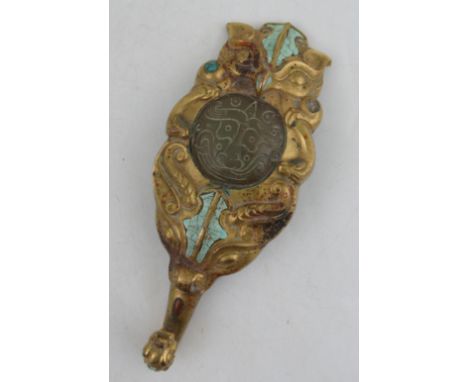 A Chinese bronze garment hook, inset with carved jade and turquoise, possibly Han Dynasty, height 7ins