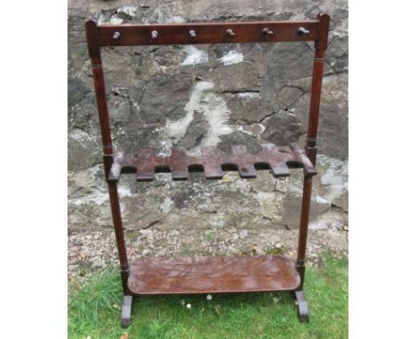 A 19th century mahogany boot and whip rack, height 42.5ins, width 27ins