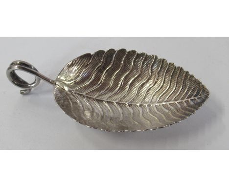 A George III silver leaf caddy spoon, London 1815, maker Elizabeth Morley&nbsp;
