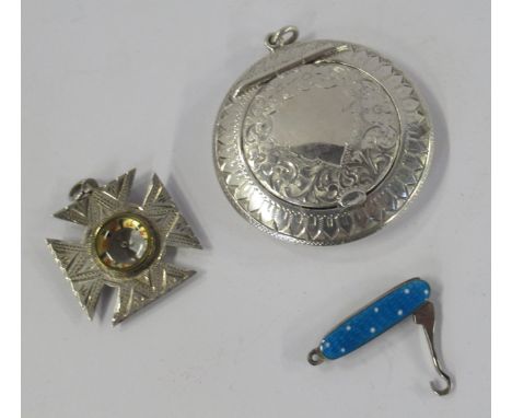 A silver compact, with engraved decoration,&nbsp;Birmingham 1921, maker Adie &amp; Lovekin, together with a miniature turquoi