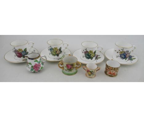 A Royal Worcester miniature loving mug, decorated with roses, height 1.75ins, together with a Royal Worcester miniature blush