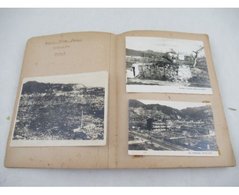 An Album of photographs and postcards , collated by the father of the vendor, who served in Japan , showing the Atomic Bomb d