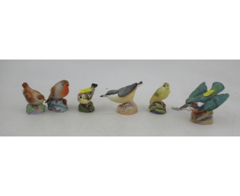 Six Royal Worcester models, of birds, Kingfisher, Wood Warbler, Nut Hatch, Goldcrest, Wren and a Robin&nbsp;Condition Report: