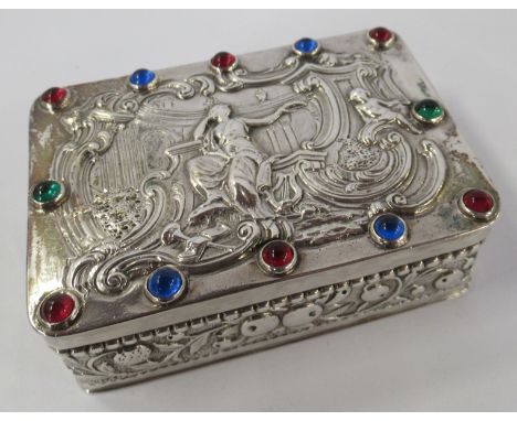 A Continental silver snuff box, of rectangular form, the hinged cover embossed with Cupid &amp; Psyche and set with coloured 