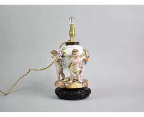 A Continental Porcelain Figural Table Lamp Set on Carved Chinese Vase Stand, Probably Sitzendorf