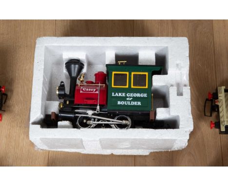 A garden railway set to include a Lehmann 1991 engine, associated carriages, a Gaugemaster DCC02 controller, a quantity of tr