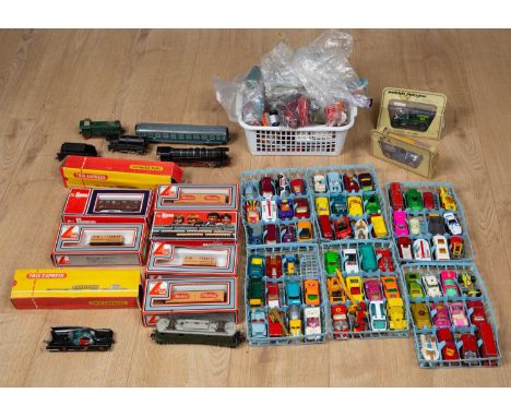 A 1970s Trix train set, together with a quantity of rolling stock and track, six boxed Lima carriages and a quantity of die c