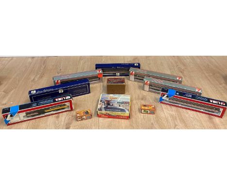 A collection of boxed toy trains to include Lima Intercity models, Pullman and 125, two restaurant buffet cars, a quantity of