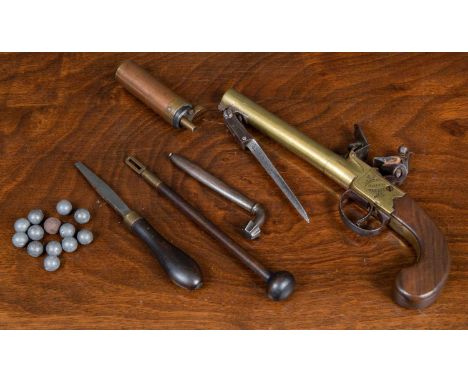 A 19th Century flintlock pistol by Smith of London with sprung bayonet released by a shifting trigger guard, complete with st