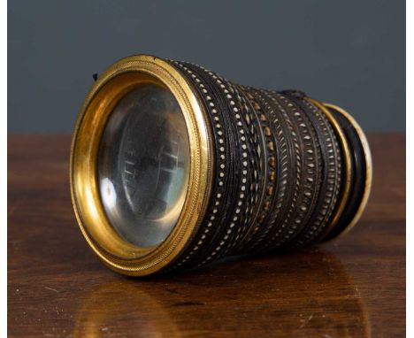 An early 19th century brass and ivory two inch spyglass by Thos. Rubergall, with engine turned bands of decoration, inscribed