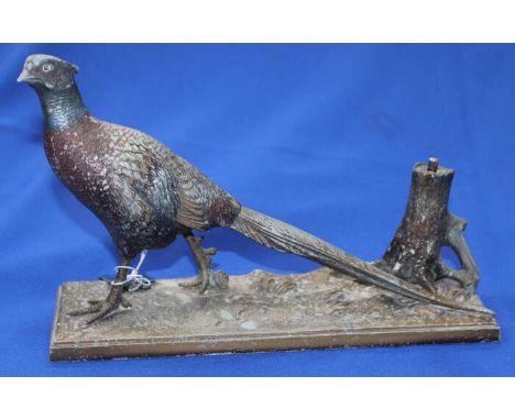 SPELTER TABLE LIGHTER MODELLED AS A PHEASANTon naturalistic plinth base, unsigned, 31cm long