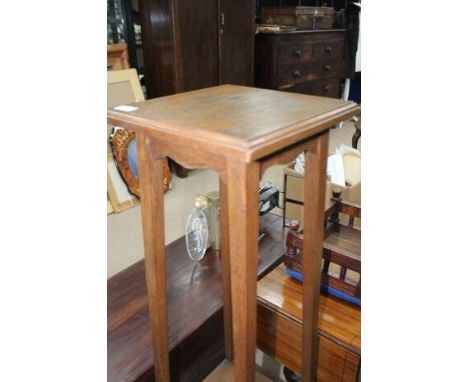 EARLY 20TH CENTURY OAK JARDINIERE STANDof tall tapering square form; together with a reproduction sofa table and a small foot