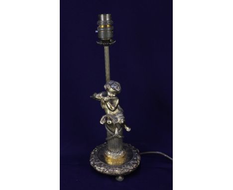 A Spanish brass figural table lamp, modelled as a cherub playing a pipe seated on a column, 33cm high