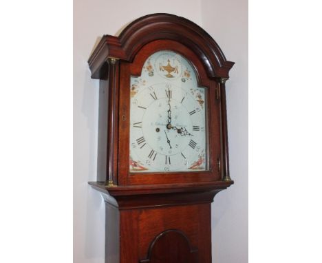 A 19th century oak longcase clock, the 12inch domed painted dial, with bird spandrels and urn surmount, with Roman and Arabic