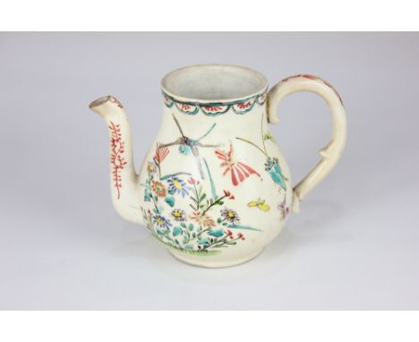 A small pottery teapot, possibly 18th century, decorated with flowers and insects on cream coloured ground, 10.5cm high, (a/f