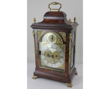 An 18th century mahogany cased bracket clock, the domed brass face with silverised dials, gilt spandrels, Roman and Arabic nu