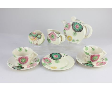 An Art Deco Clarice Cliff Newport pottery 'Bonjour' part breakfast set for two, decorated with a Rhodanthe variant pattern of