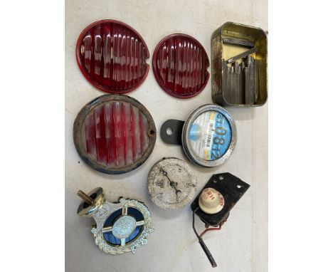Three original red glass pork pie lamp lenses, a Smiths oil pressure gauge, a tin of letter/number punches and various other 