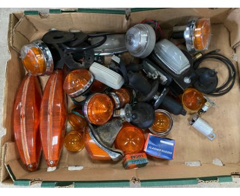 A tray of indicators, light fittings etc.