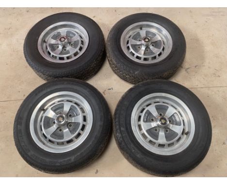 A set of four Jaguar wheels to suit XJ6 models. 