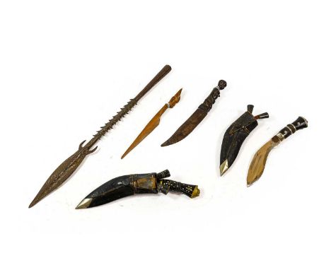 A 19th Century Masai Spear, the leaf shape blade on a twisted socket and wood haft with steel square tapering spike butt; als
