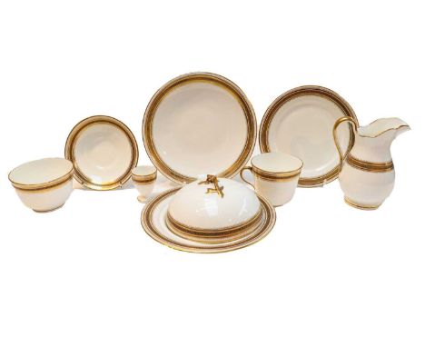 An English porcelain breakfast service for six, including: egg cups, tea cups and saucers, milk, sugar, plates, two serving p