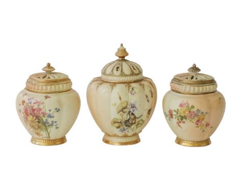 Three Royal Worcester ivory potpourri vases and covers, including 'The Stewart', each decorated with floral sprigs and gilt b