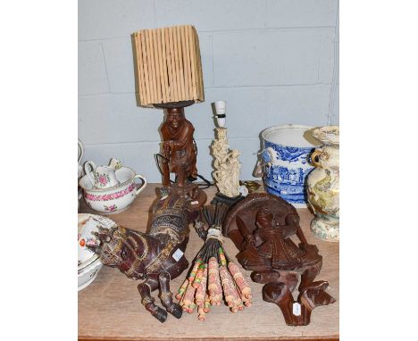 Decorative Asian items including a carved root wood lamp base, another resin example, a carved wooden figure of a horse, a ca